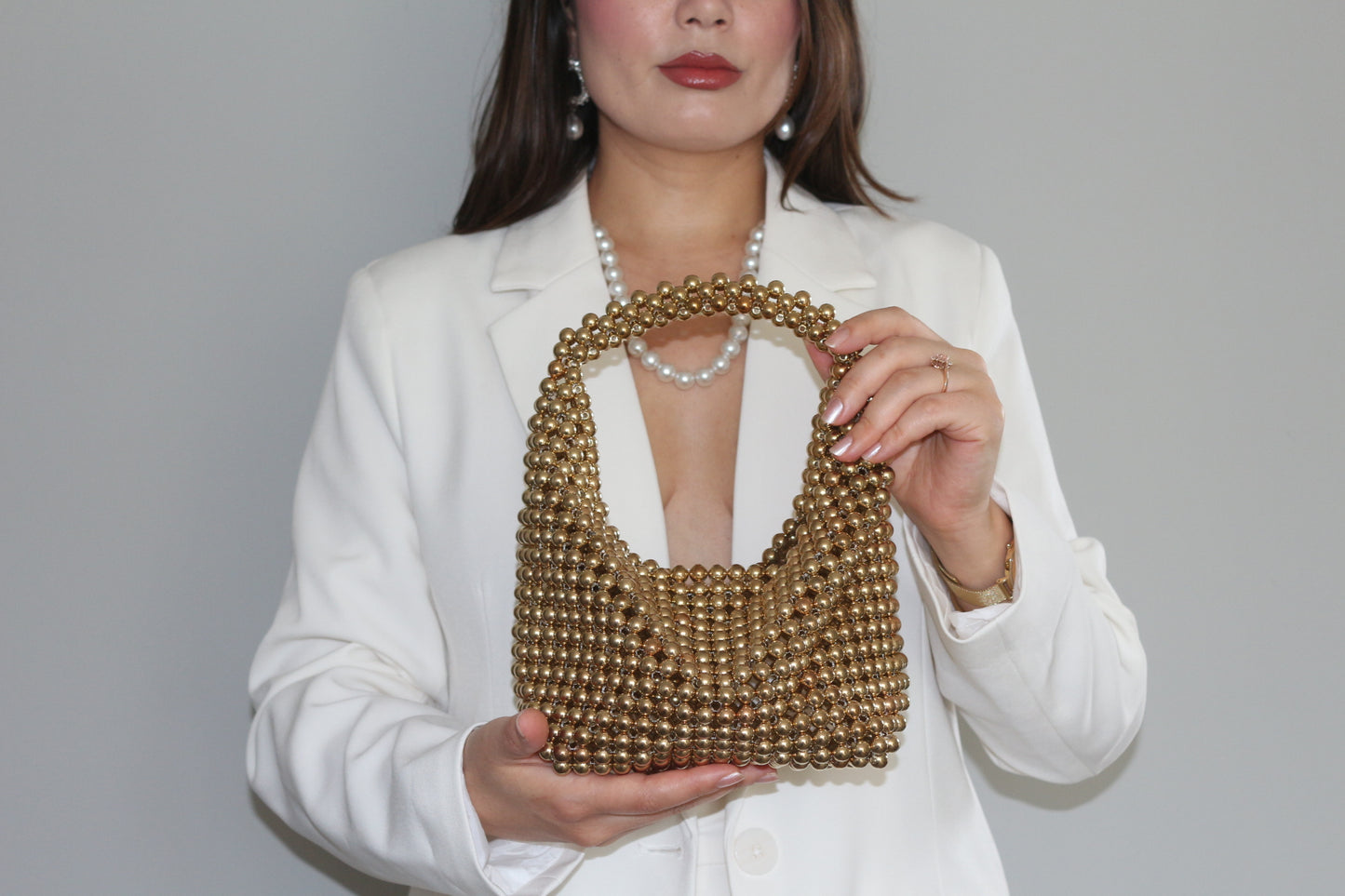 Helius Gold Beaded Handbag